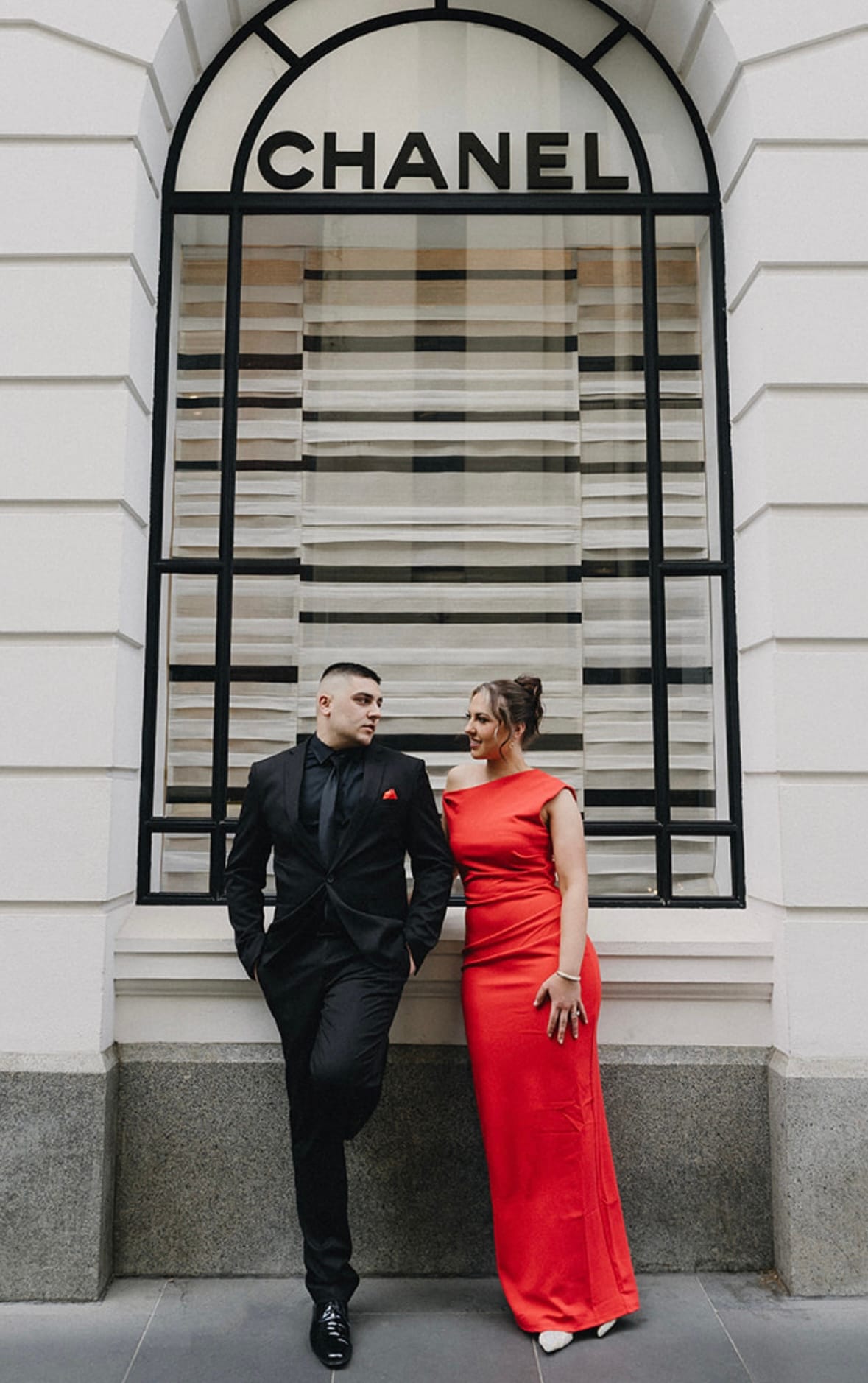 Couple dressed for a formal occasion standing together